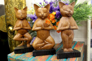 hand carved yoga cats