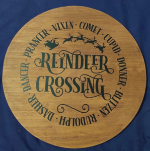 reindeer crossing wooden sign